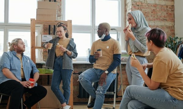 group eating and talking to each other